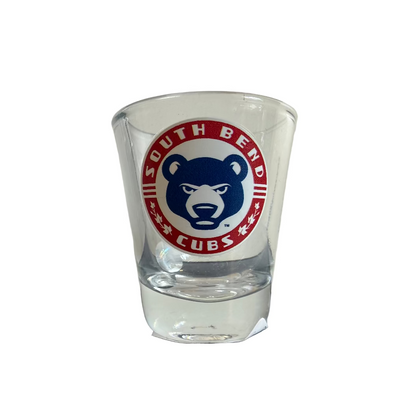 Clear shot glass with South Bend Cubs logo on a white background
