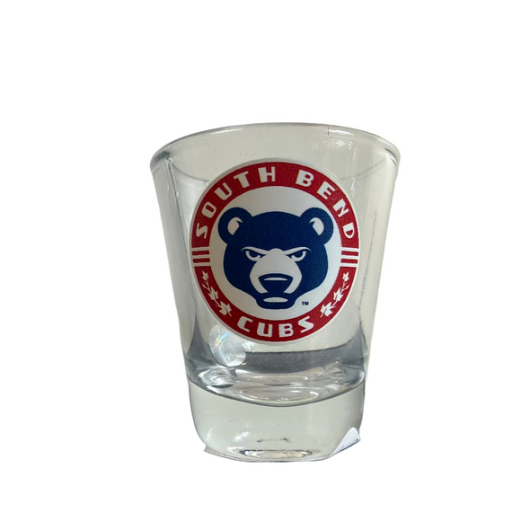 Clear shot glass with South Bend Cubs logo on a white background